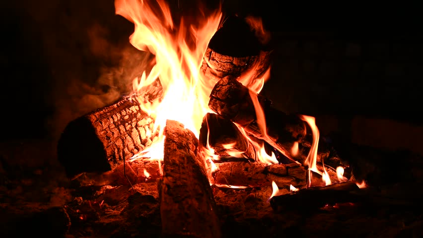 Camping, survival, night, burning campfire