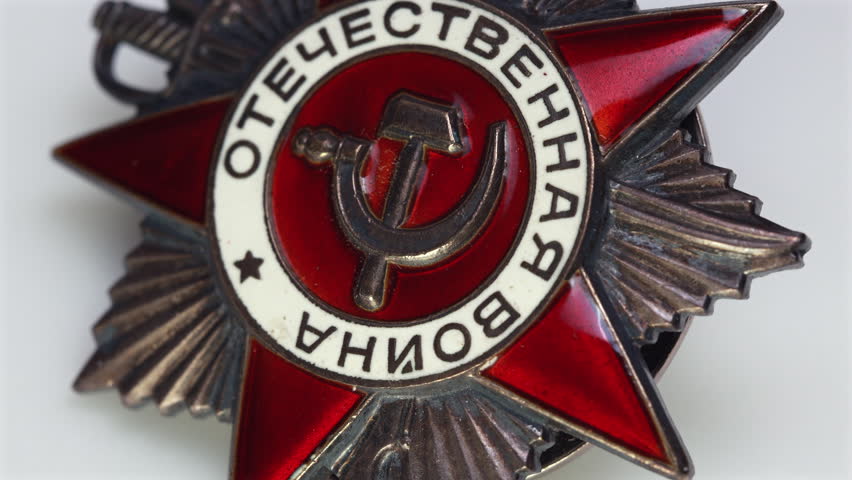 Extreme macro pan over Soviet Order of Patriotic War medal details
