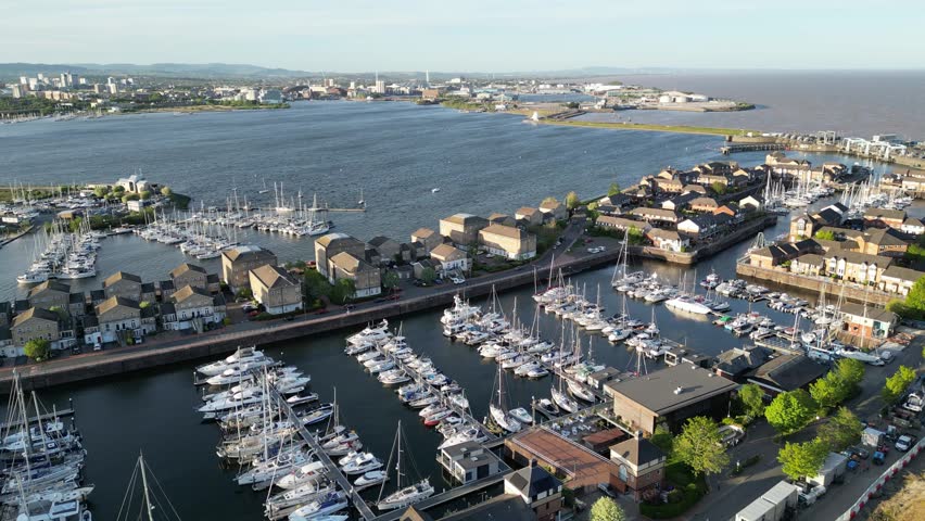 4K Aerial Shot Flying From Penarth Pier Toward Cardiff Bay Barrage, Wales	