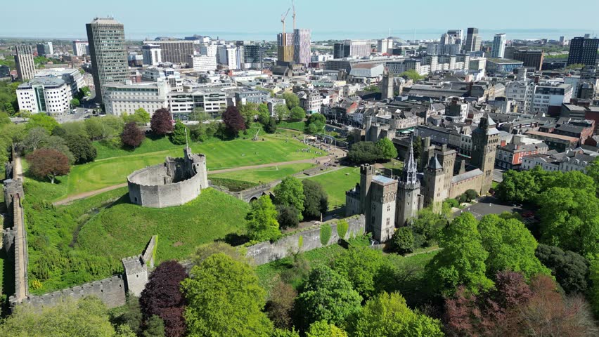 4K Aerial Rising Shot of Cardiff Castle and Cardiff City Centre in Wales	

