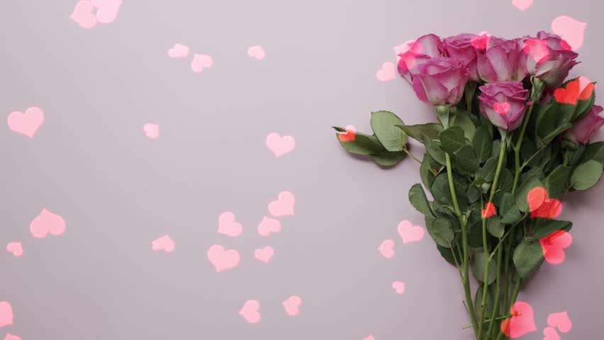 Celebrate love with this romantic Valentine’s Day animation featuring a “Be My Love” message on a table beside a pink rose bouquet, as glowing red hearts gently float upward in a dreamy, heartfelt scene