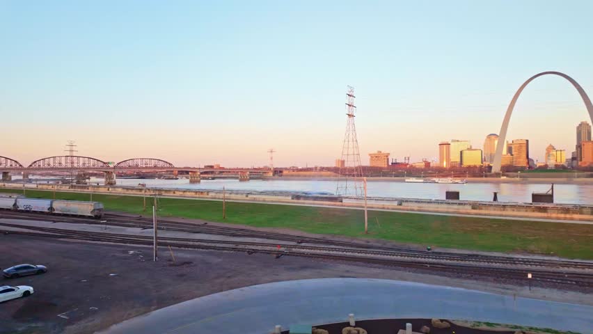 Sunrise view of Gateway Arch National Park with downtown St Louis skyline in Missouri