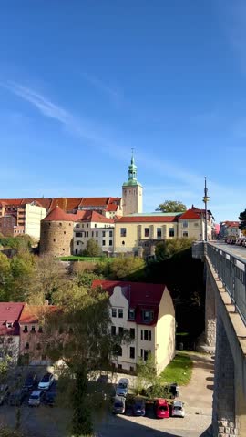 Bautzen, Germany - November 03 2022: Panoramic view of Bautzen, Germany, showcasing the historic skyline with its medieval architecture. Prominent structures include the stone towers of the Ortenburg Castle and the distinctive St. Peter