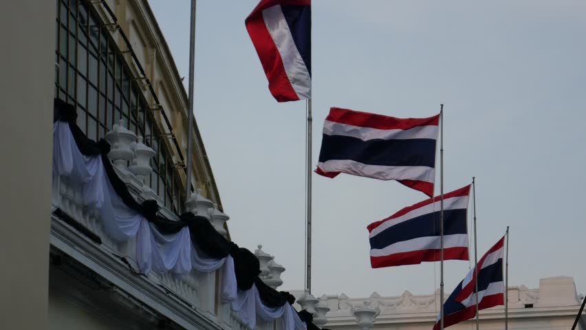 Thai National Flag agaist blue sky