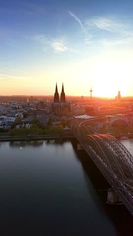 Aerial view of the skyline of Cologne, Germany, with River Rhine and Dome during a beautiful summer sunset