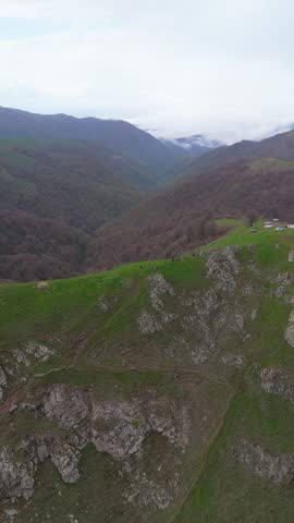 Mountain Ridge Landscape with Hikers and Valley View
