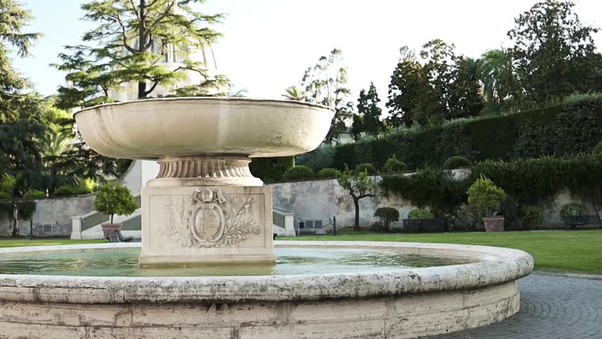 Classical stone fountain in a beautiful park in Rome, Italy. High quality FullHD footage