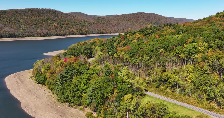 Autumn aerial video of the bridge of the Cannonsville Reservoir, Delaware County, NY, NYC DEP water supply, October 2025.