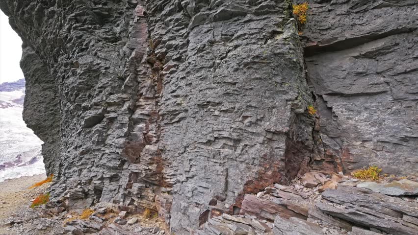 Scenic footage of the rugged cliff faces and majestic landscape along the Skyline Trail, leading to the stunning vistas at Panorama Point in Mount Rainier National Park, Washington State, USA.