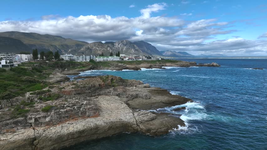 Drone flight over the seaside cliffs in Hermanus, South Africa.