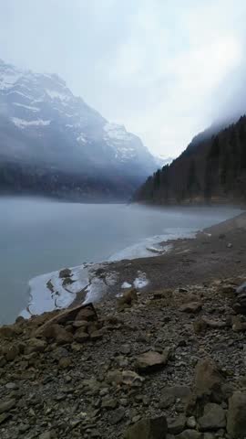 Klöntalersee picturesque alpine reservoir lake in the Canton of Glarus, Switzerland