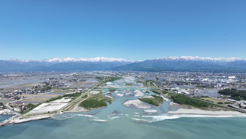 A view of the Kurobe River alluvial fan from the mouth of the Kurobe River in spring.