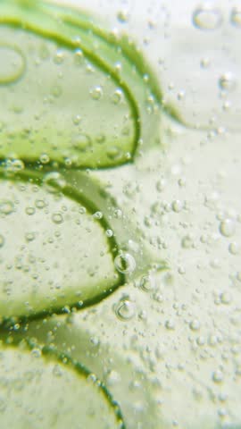 Vertical serum aloe gel background, cream, shampoo, soap bubbles, foam texture