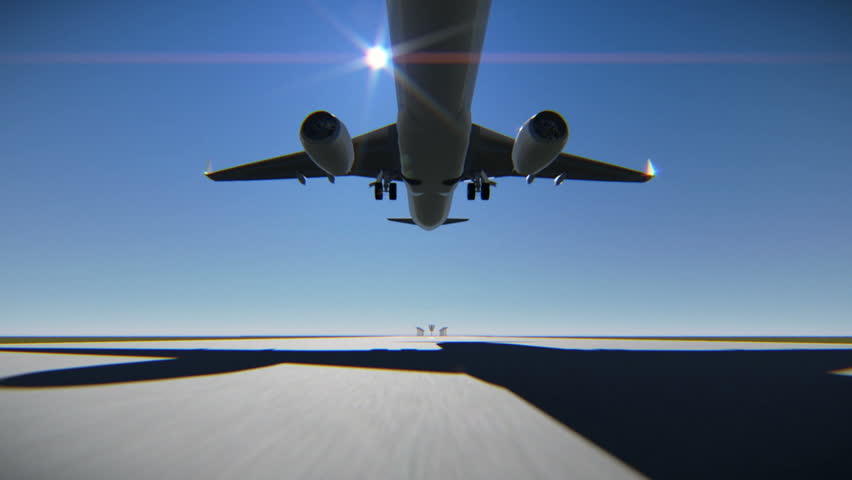 Airplane landing on the airport runway. Bottom view of the plane
