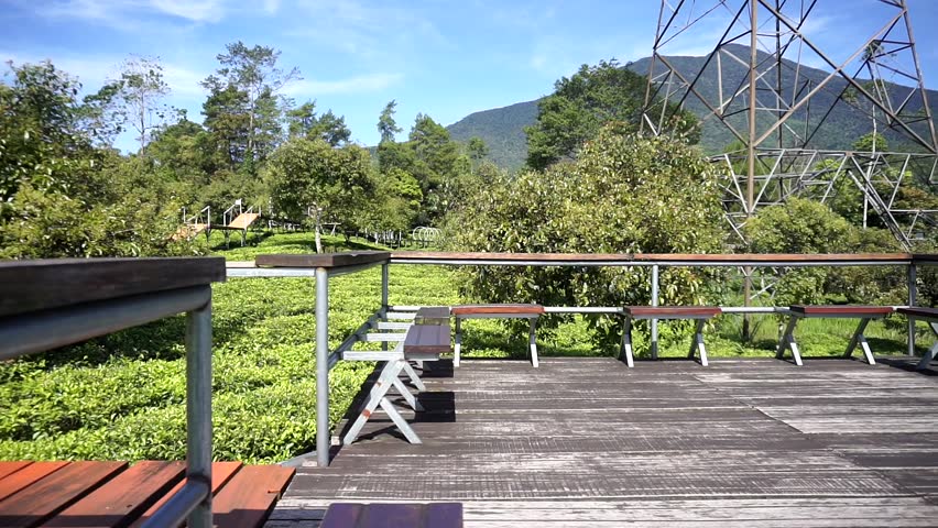 Relaxing outdoor seating area with mountain scenery and a calm natural atmosphere.
