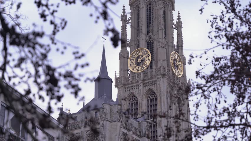 Notre Dame Cathedral in Antwerp on a cloudy Christmas day. The clock church with one of the highest towers in Belgium
