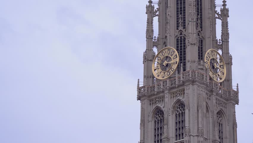 Notre Dame Cathedral in Antwerp on a cloudy Christmas day. The clock church with one of the highest towers in Belgium