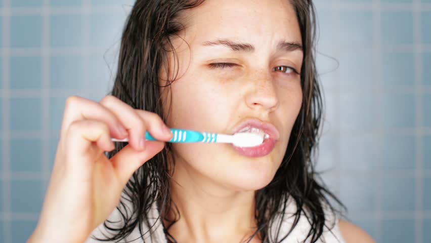 healthy young woman brushing teeth bathroom Stock Footage Video (100% Royalty-free) 4069051 | Shutterstock