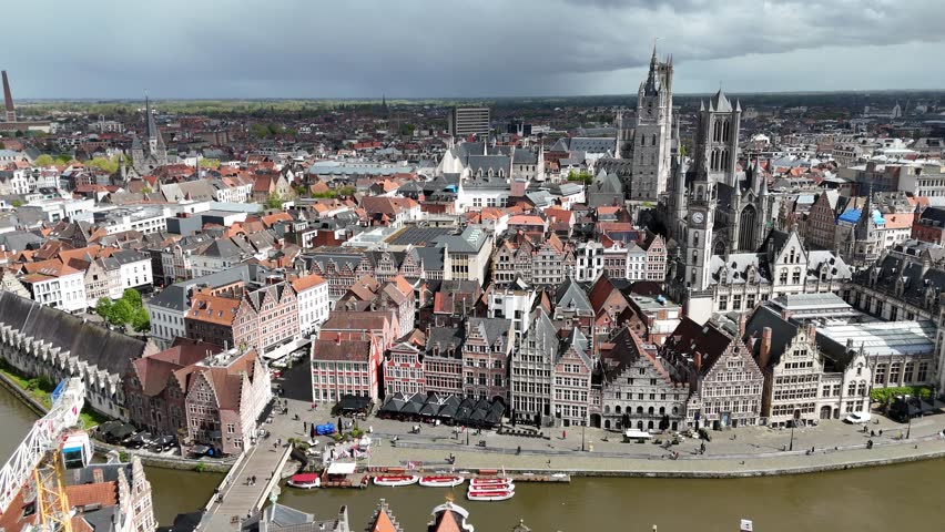 Aerial skyline of Ghent old town, Belgium, with famous landmarks "three Towers" (Belfry of Ghent, St. Bavo