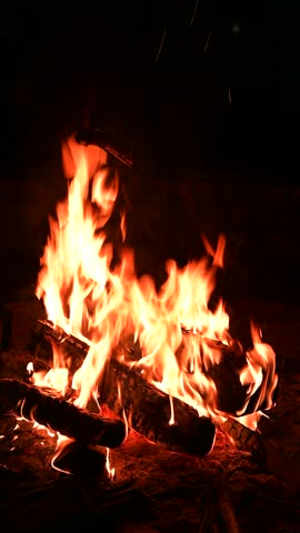 Camping, survival, night, burning campfire