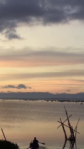 Boat Sailing on Water at Sunset