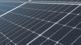 Solar panel modules generate clean electricity using photovoltaic cell technology at renewable energy farm. Sustainable power equipment for environment protection and green future closeup. - Powered by Shutterstock - Get 15% off with code: PIKWIZARD15