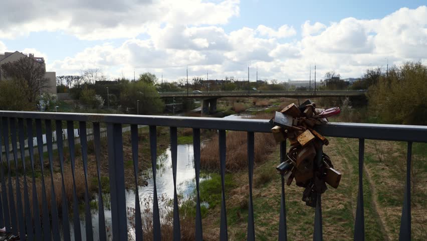 Love locks on a bridge over the Cybina channel. Poznan, Poland.