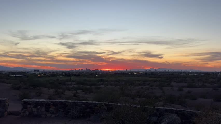 Phoenix Arizona Skyline Sunset Footage with Dramatic Evening Sky and Urban Silhouette Landscape