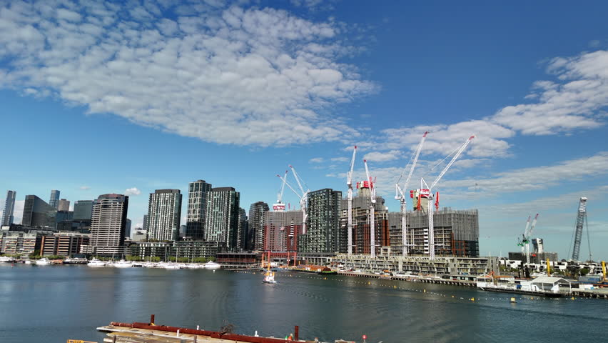 Melbourne Docklands, cityscape with activity on the waterfront. 