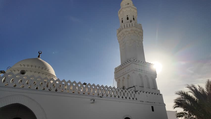 Masjid al-Qiblatayn with classic Islamic architecture and tall minarets beneath a clear sky, a key religious landmark and pilgrimage site in the holy city of Medina, Saudi Arabia
