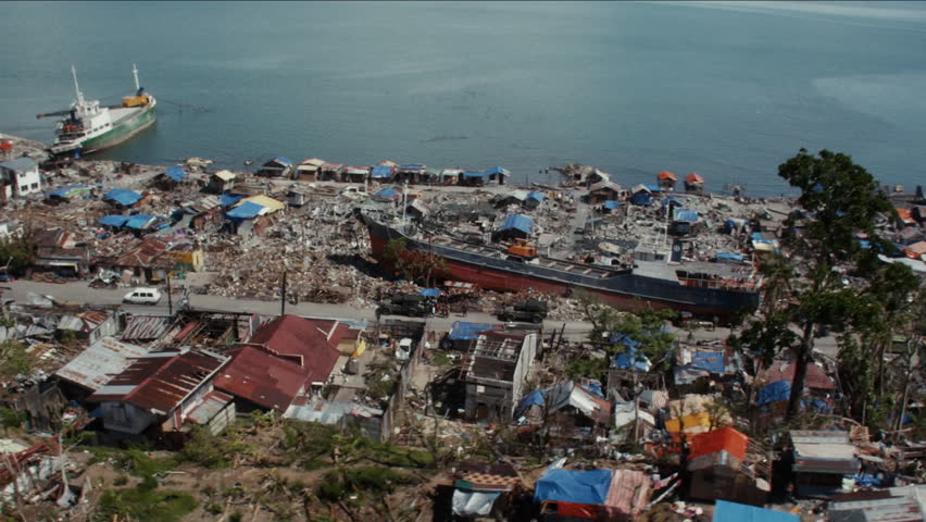 Aerial view of widespread destruction and ships washed ashore after Super Typhoon Haiyan in Tacloban