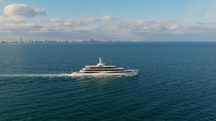 Yacht sailing at sea. Luxury private yacht in sea. Motor yacht luxury vessel. Boat motor aerial. Vacation on summer. Aerial view motorboat. Luxury lifestyle. Vacation on summer. Yacht at sea.