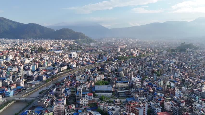 Kathmandu Nepal Drone View Dense south asia Urban City in Valley with Hills and Himalaya Background