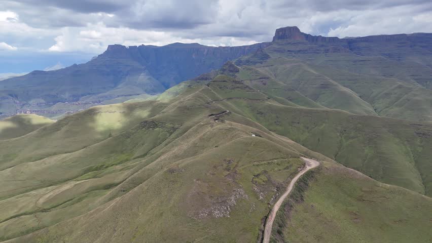 Mountain Scenic Pathway. Remote Ridgeline Highway Coursing Through Majestic Mountain Landscapes