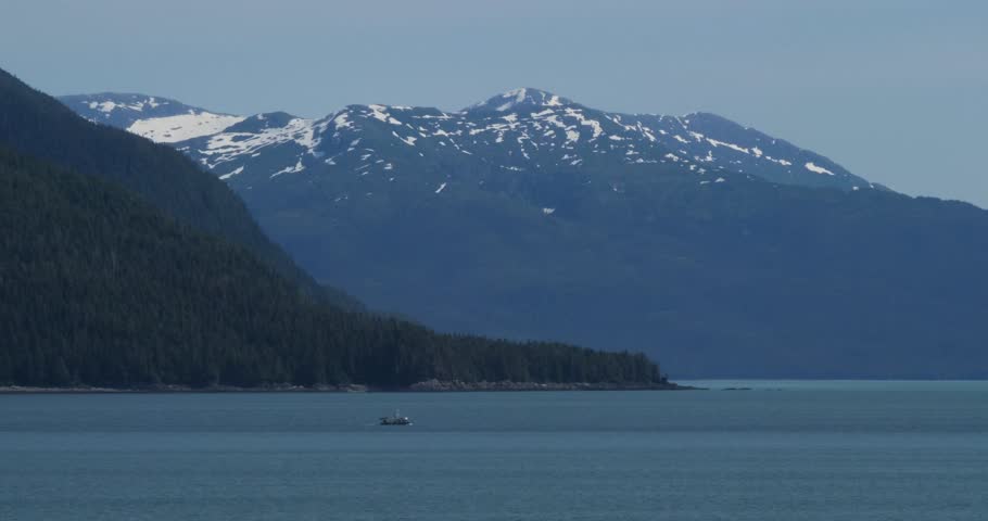 Beautiful landscape with snow-capped mountains around Juneau, Alaska in summertime.