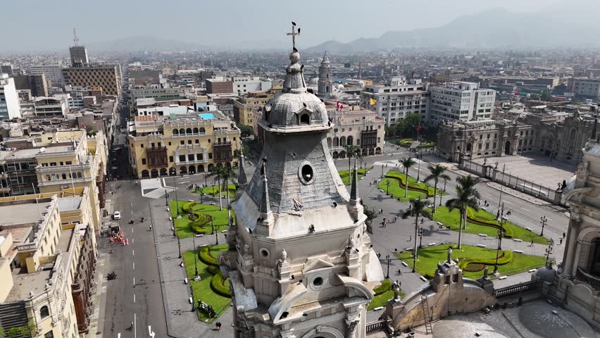 Plaza Mayor In Lima Metropolitan Region Peru. Aerial View Of A High-Rise Buildings And Traffic Showcasing Urban Life. Industrial Landscape Buildings Stunning. Industrial Town.