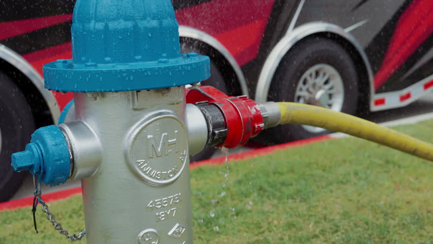 Fire Hydrant and Hose Leaking Water