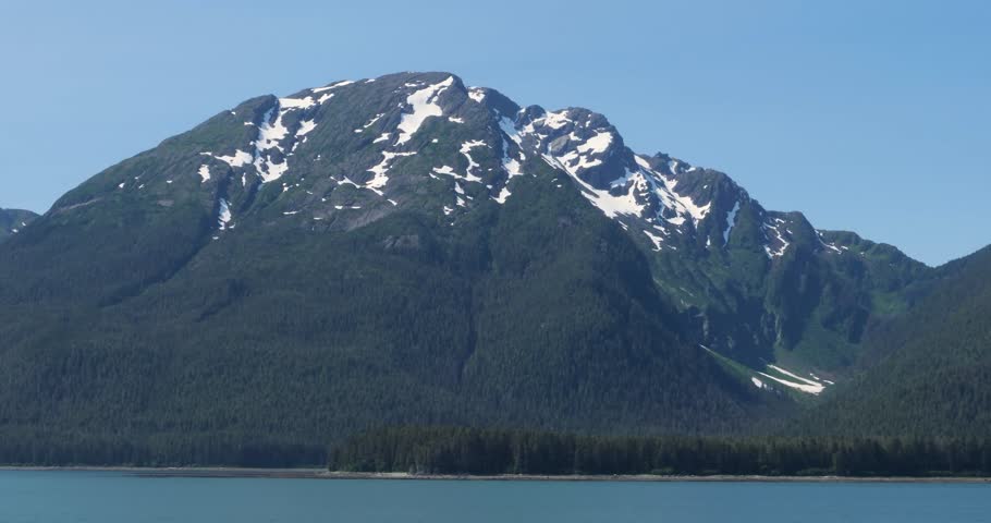 Beautiful snow-capped mountains around Juneau, Alaska in summertime.