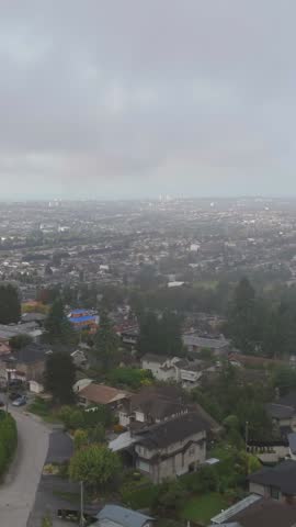 Panoramic Aerial View of Burnaby Cityscape on a Cloudy Day in British Columbia, Canada