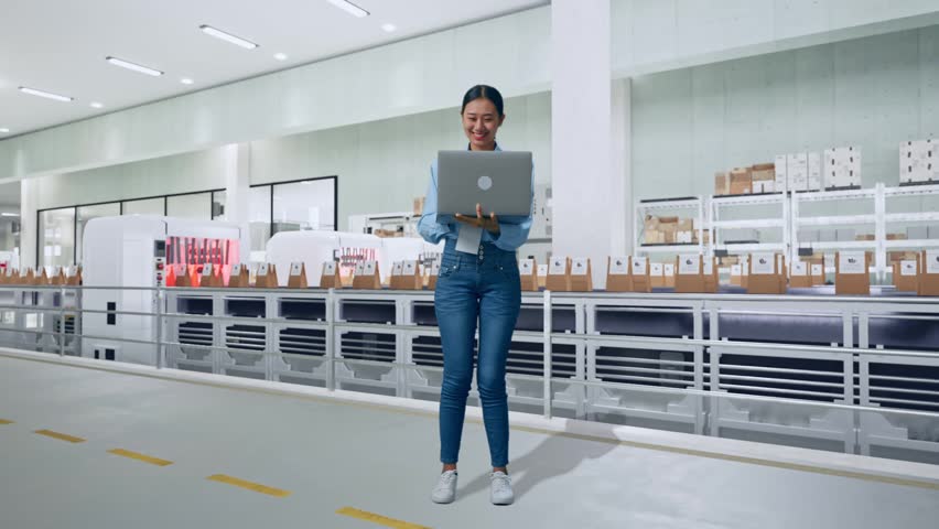Full Body Of Asian Female With Her Laptop With Conveyor for Packaging Coffee Beans in Bags at Coffee Factory, Working Continuously