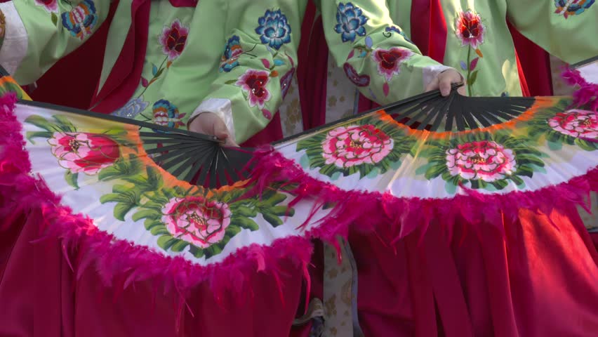 A Person Performing Korean Traditional Fan Dance