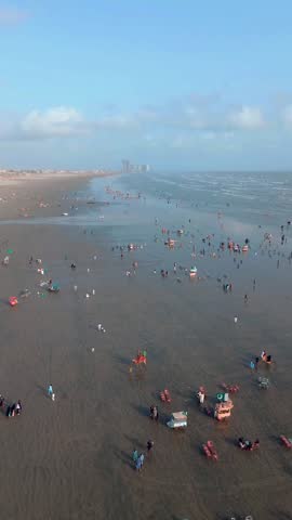 People enjoying holiday at clifton sea view beach, Karachi Pakistan 