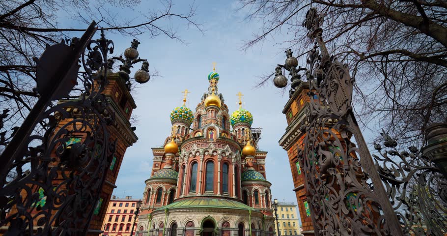 The golden domes of the cathedral were saved on Blood through the wrought-iron gates of the Mikhailovsky Garden on a May morning