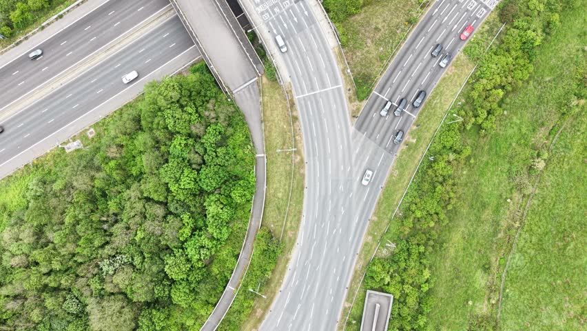 Aerial view above traffic flowing over a bride at an M4 motorway junction, United Kingdom