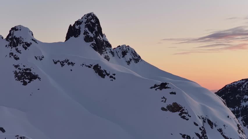 Majestic Snow-Capped Mountains at Sunset in British Columbia, Canada