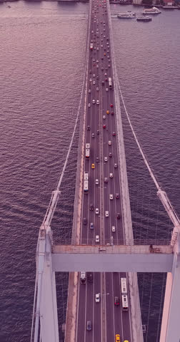 Aerial View of the Bosphorus Bridge in Istanbul, Turkey, with Evening Traffic at Sunset