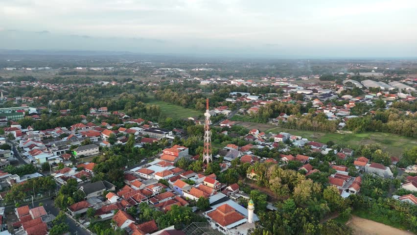 Aerial View of Telecommunication Tower BTS in the Middle of Indonesian Residential Area
