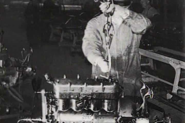 1910s - Cars are built by hand at the Ford factory in 1919 and maintained at service centers.