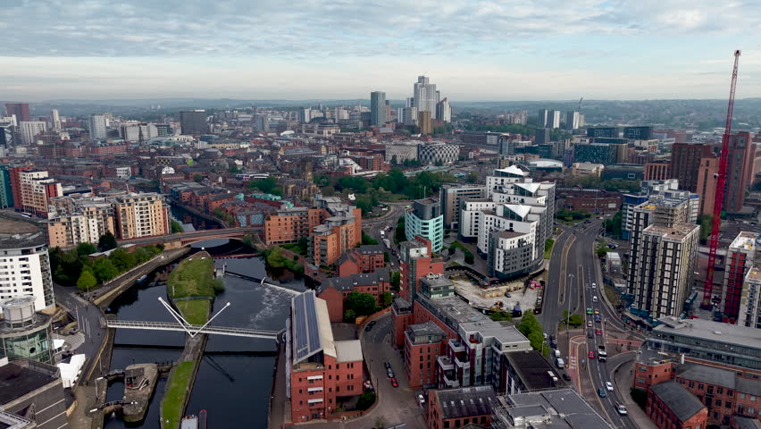 Drone Aerial view flying over Leeds city centre skyline in Yorkshire, UK.