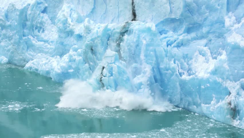 4K Close-Up of Glacier Ice Collapse Into Ocean Water – Global Warming, Melting Icebergs, Rising Sea Levels and Climate Change Concept